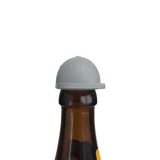 Gray Tapemonster bottle cap in baseball-cap design on a bottle